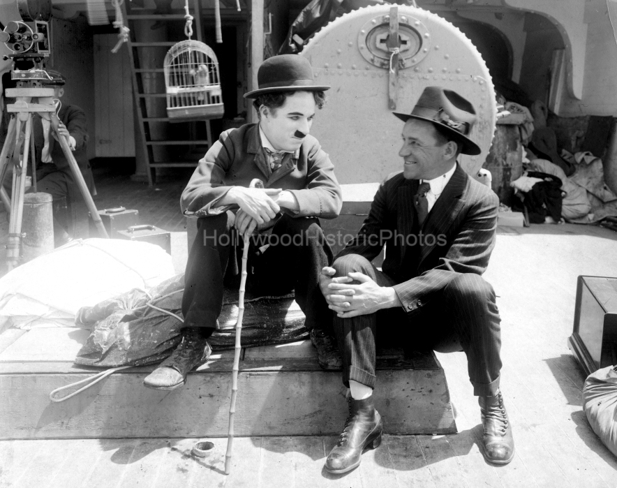 Charlie Chaplin 1917 The Immigrant with Studio manager John Jasper WM.jpg